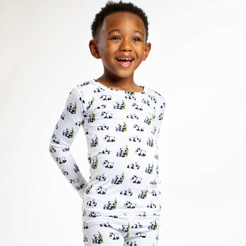 Ultra-soft kids’ bamboo pajamas featuring an adorable, snuggly panda pattern for cozy nights.