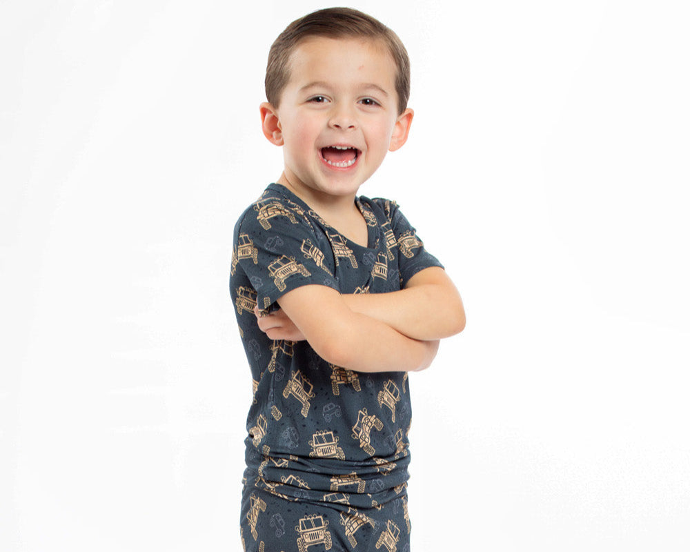 Earthly Threads off-road truck bamboo pajamas for kids, perfect for adventure lovers.