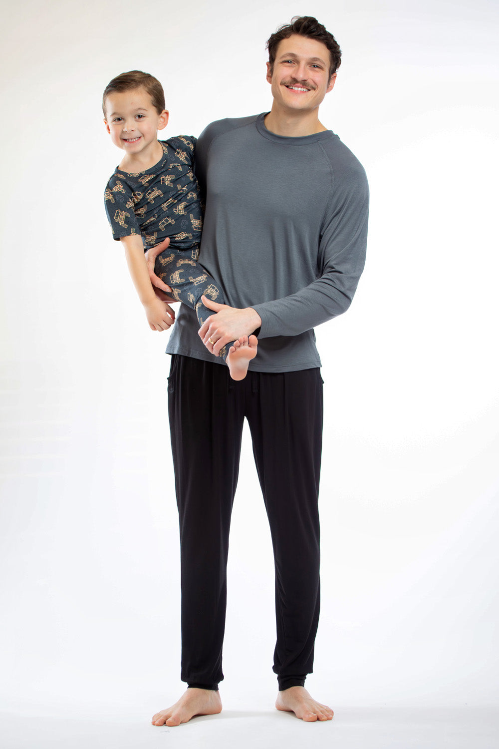 Breathable and gentle Earthly Threads bamboo pajamas for sensitive skin featuring a fun and playful truck pattern.