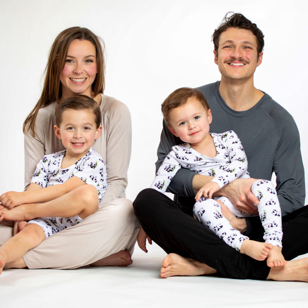 Earthly Threads eco-friendly kids' pajamas with short sleeves and shorts, featuring an adorable panda pattern. 