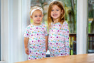 Cozy and breathable bamboo kids’ pajamas with hearts and crowns, perfect for sleep or lounging.