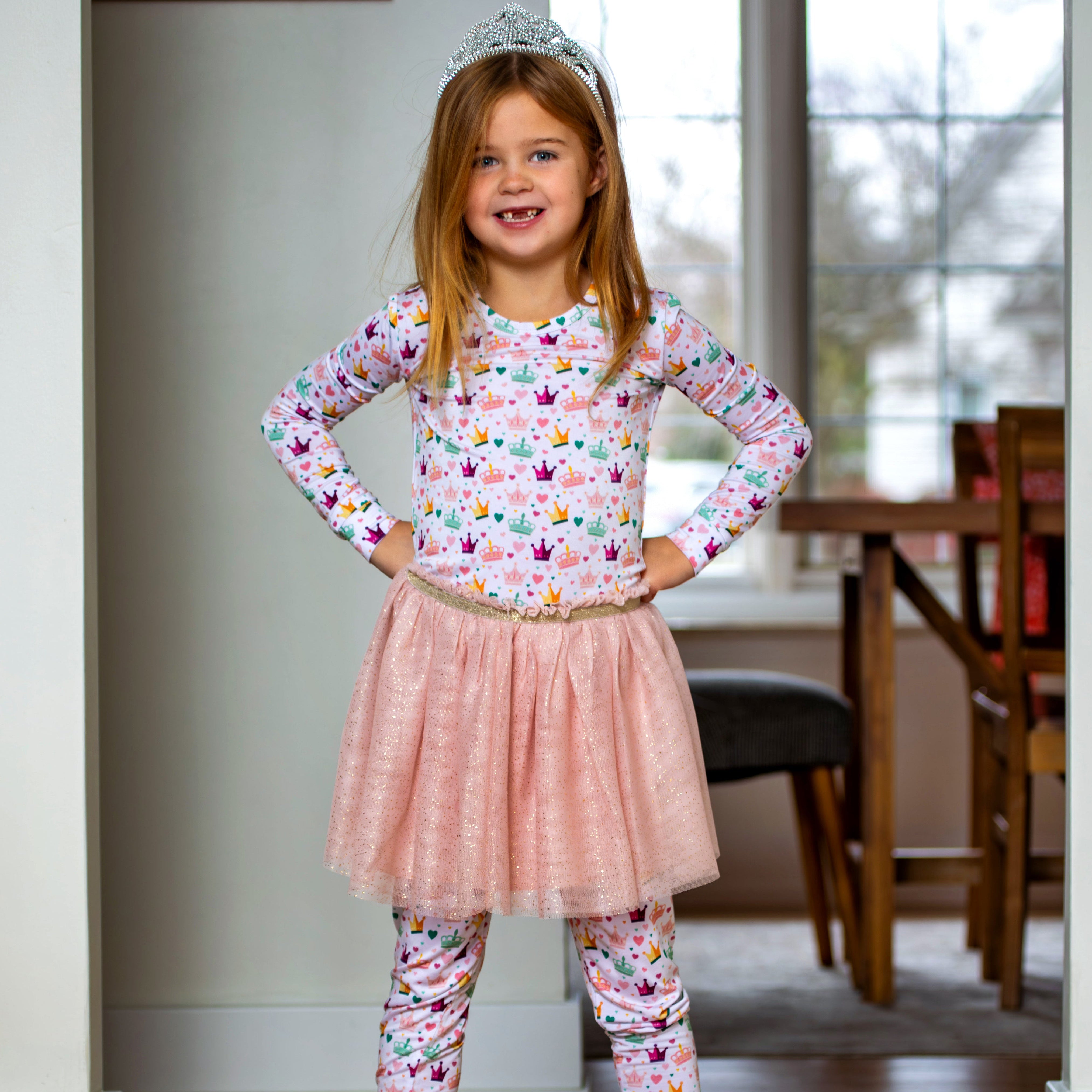 Drift into royal dreams with the Earthly Threads Royal Slumbers Two-Piece Pajama Set, designed for little ones who love a touch of magic. Featuring delicate hearts and crowns, this ultra-soft set is fit for storybook snuggles and princess-worthy dreams. Made from our buttery soft, breathable bamboo fabric, it keeps your little one cozy, comfortable, and wrapped in adorable luxury all night long.