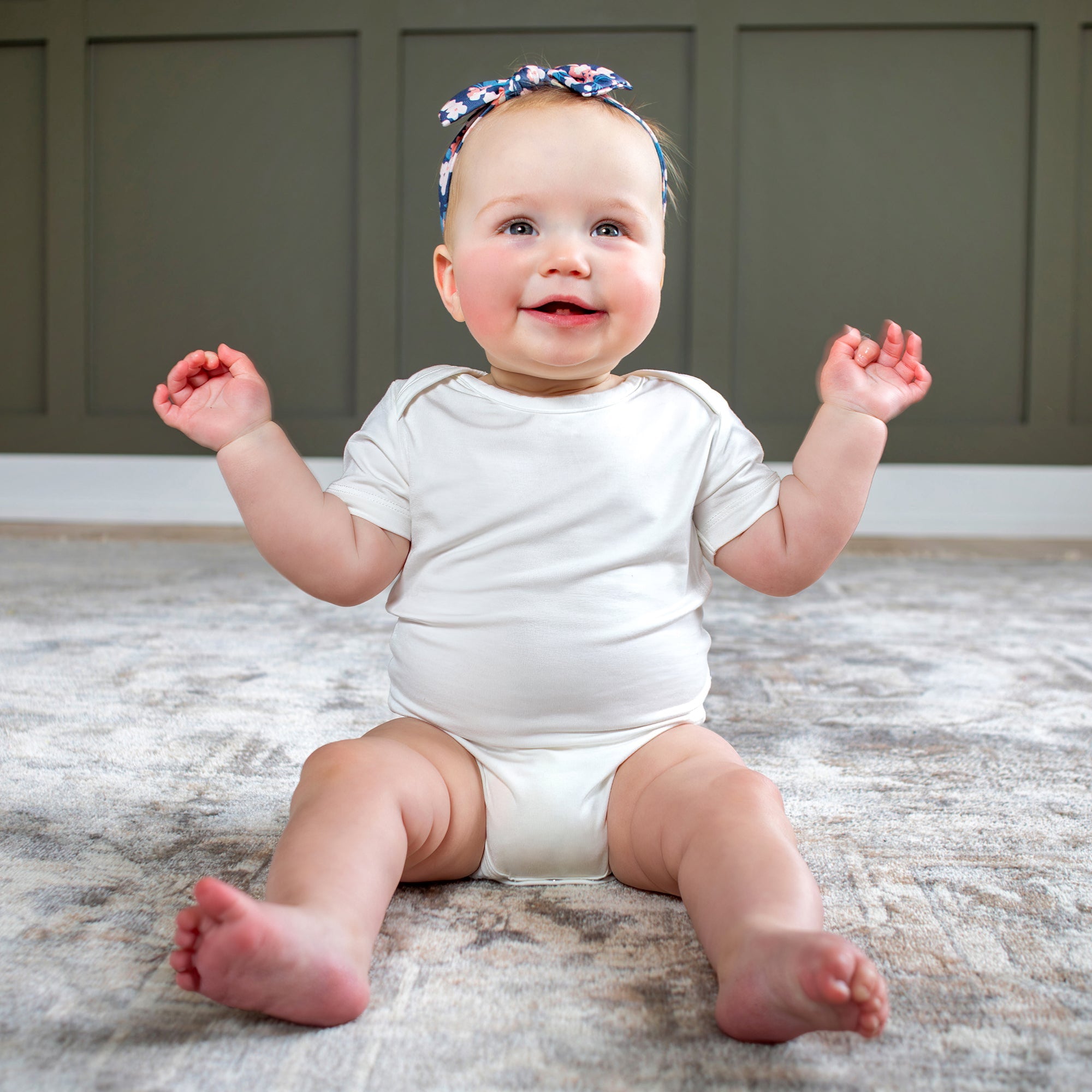 Earthly Threads bamboo baby short sleeved bodysuit or onesie is an essential for hot summer nights or layering for comfort, available in an array of neutral colors.