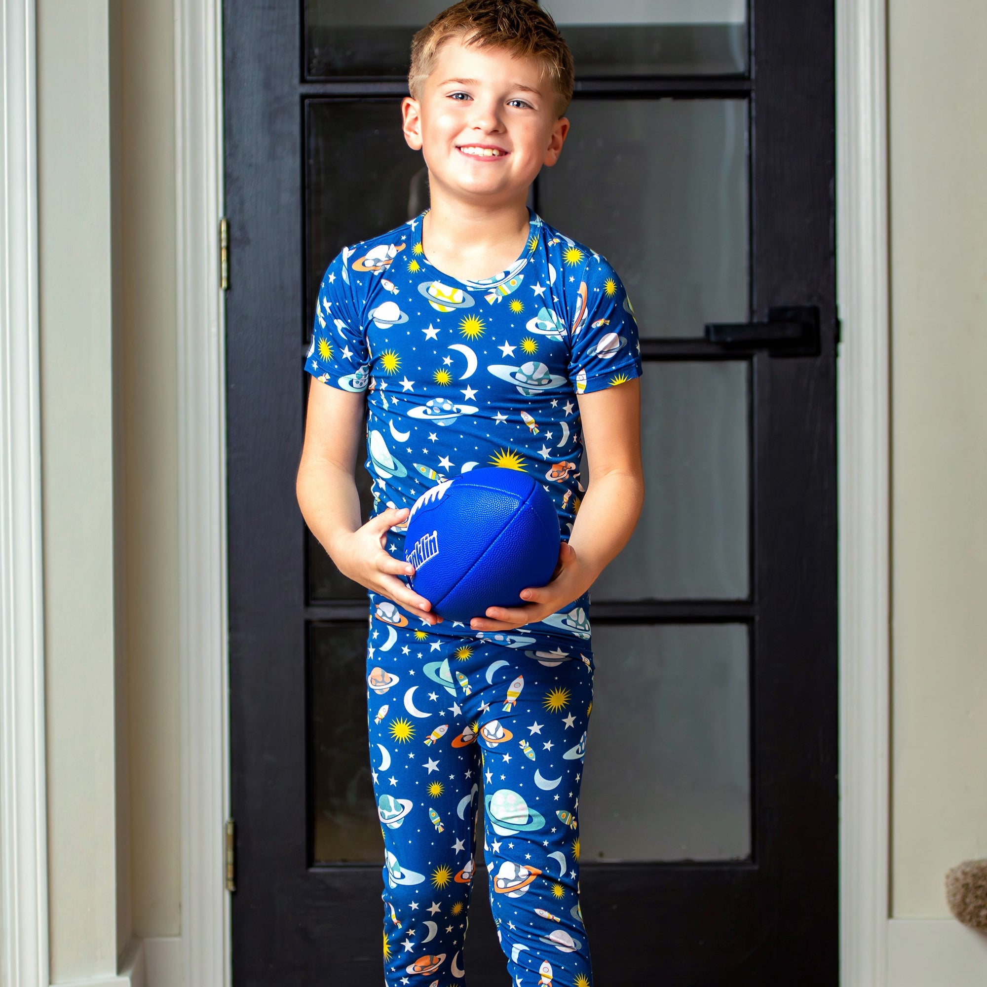 Planets and stars bamboo pajamas for your little sleepy explorers from Earthly Threads.
