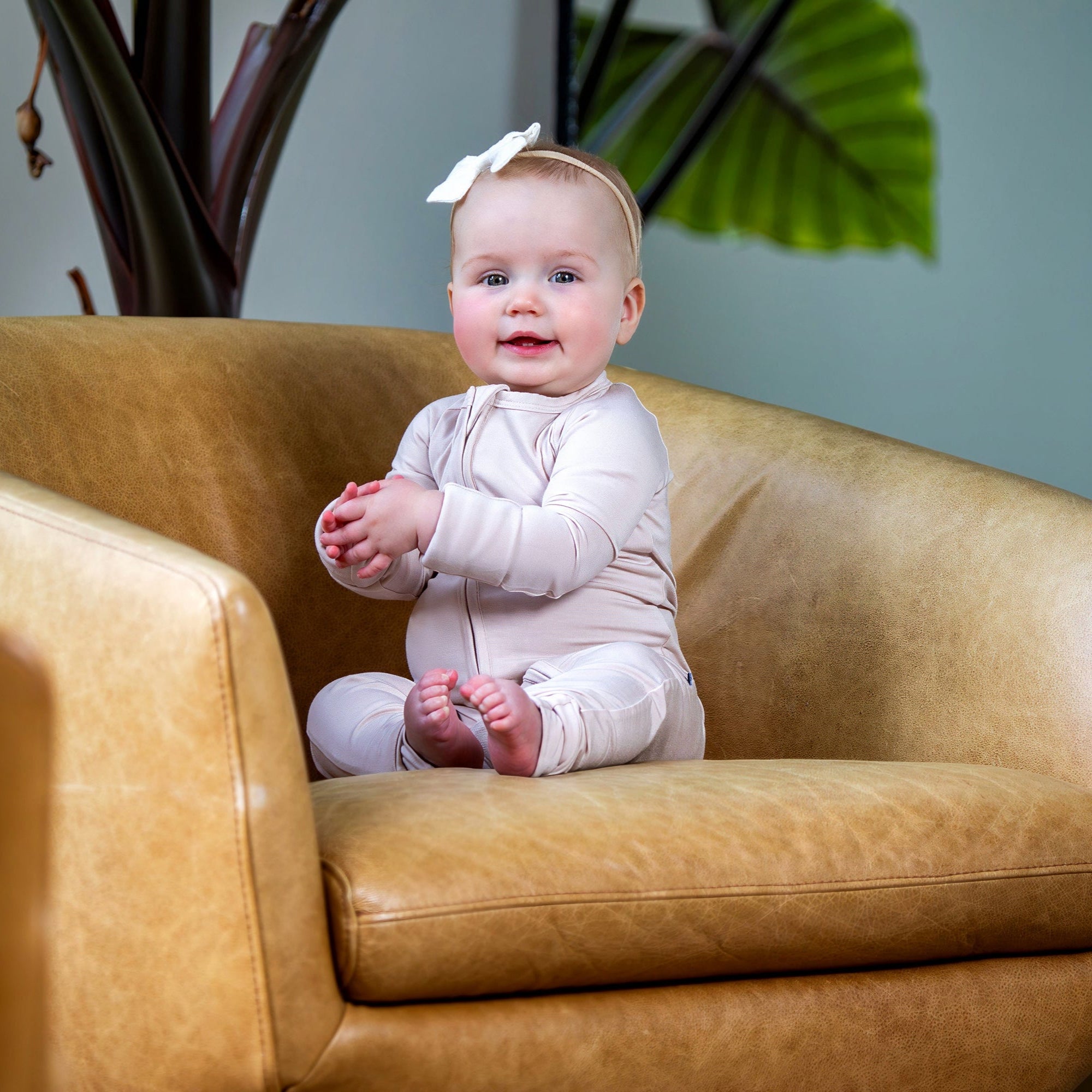 Earthly Threads bamboo zip romper with fold-over mitts and foot cuffs that are luxuriously soft, breathable, and designed to grow with baby for ultimate comfort during frequent growth spurts!