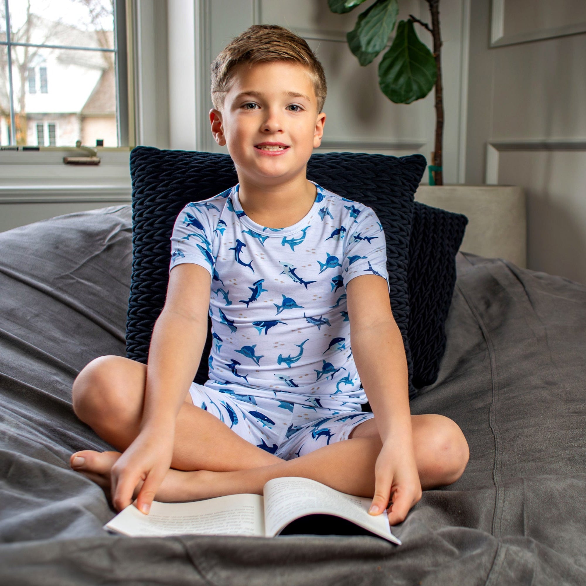 Hammerhead and great white shark print pajamas for kids, made from organic bamboo and designed for the coziest night of sleep.