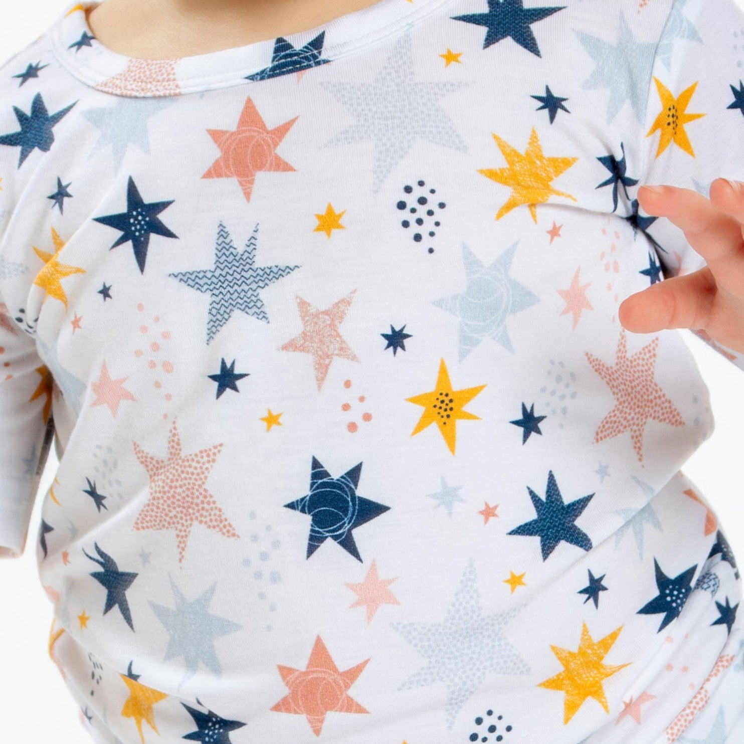 Earthly Threads kids short sleeve pajamas with a twinkling star and galaxy print, crafted with incredibly soft and soothing bamboo fabric.
