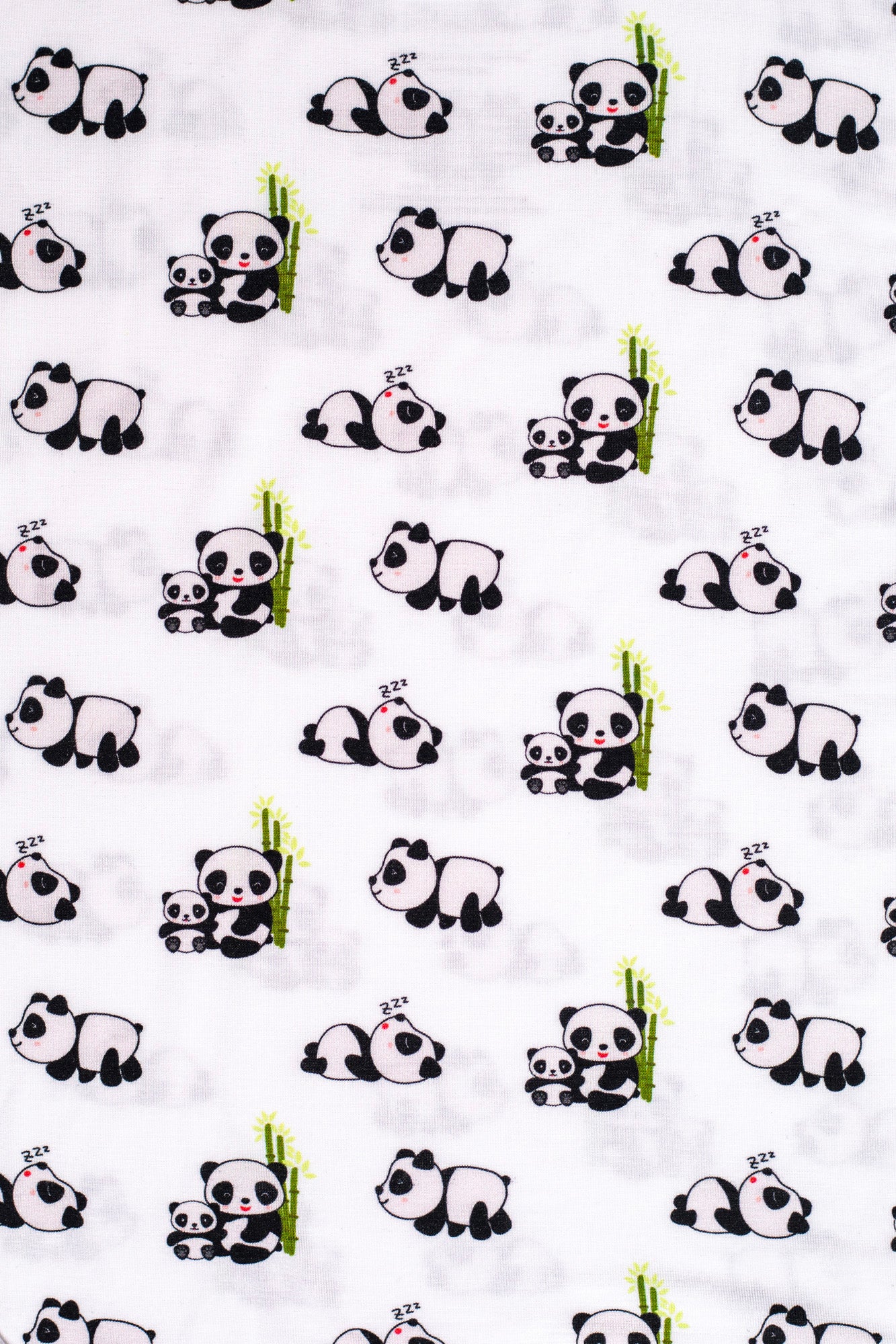 Earthly Threads soft bamboo pajamas for kids with sensitive skin, featuring an adorable print of pandas cuddling bamboo.