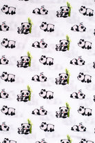 Earthly Threads soft bamboo pajamas for kids with sensitive skin, featuring an adorable print of pandas cuddling bamboo.