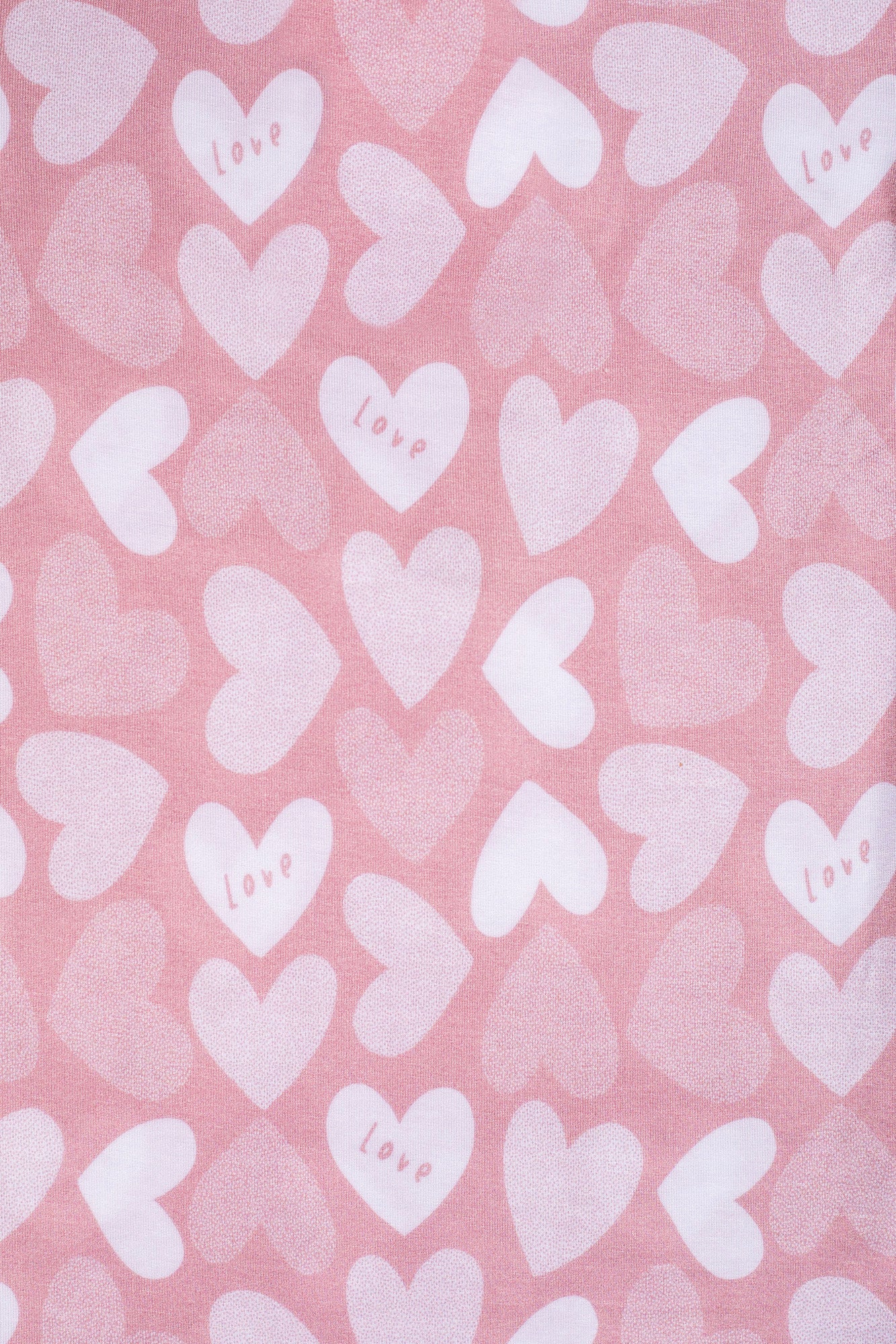 Earthly Threads soft bamboo pajamas with pink and white hearts for kids.