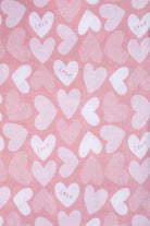 Earthly Threads soft bamboo pajamas with pink and white hearts for kids.