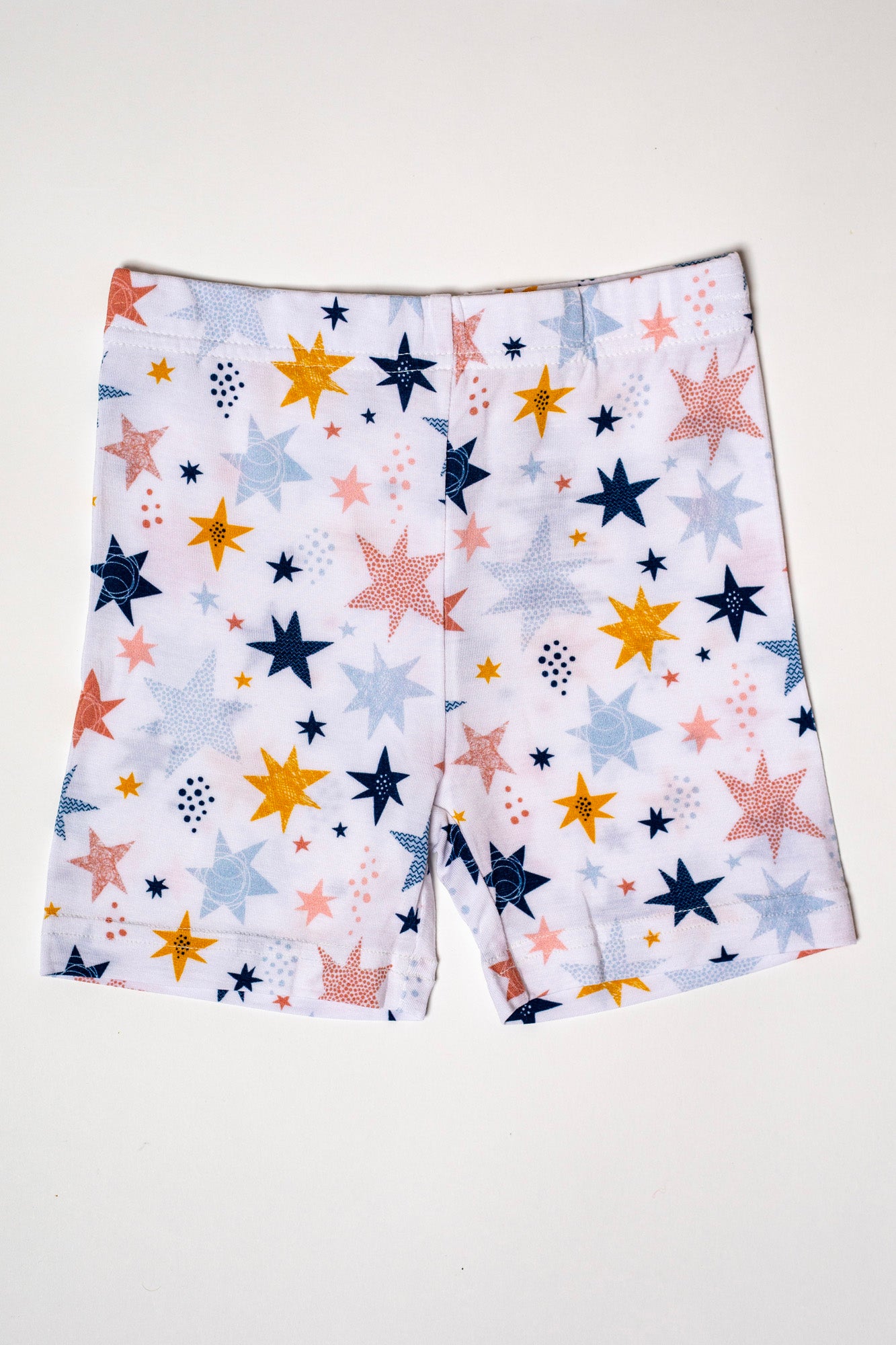 Hypoallergenic and moisture-wicking bamboo sleepwear featuring twinkling stars. 