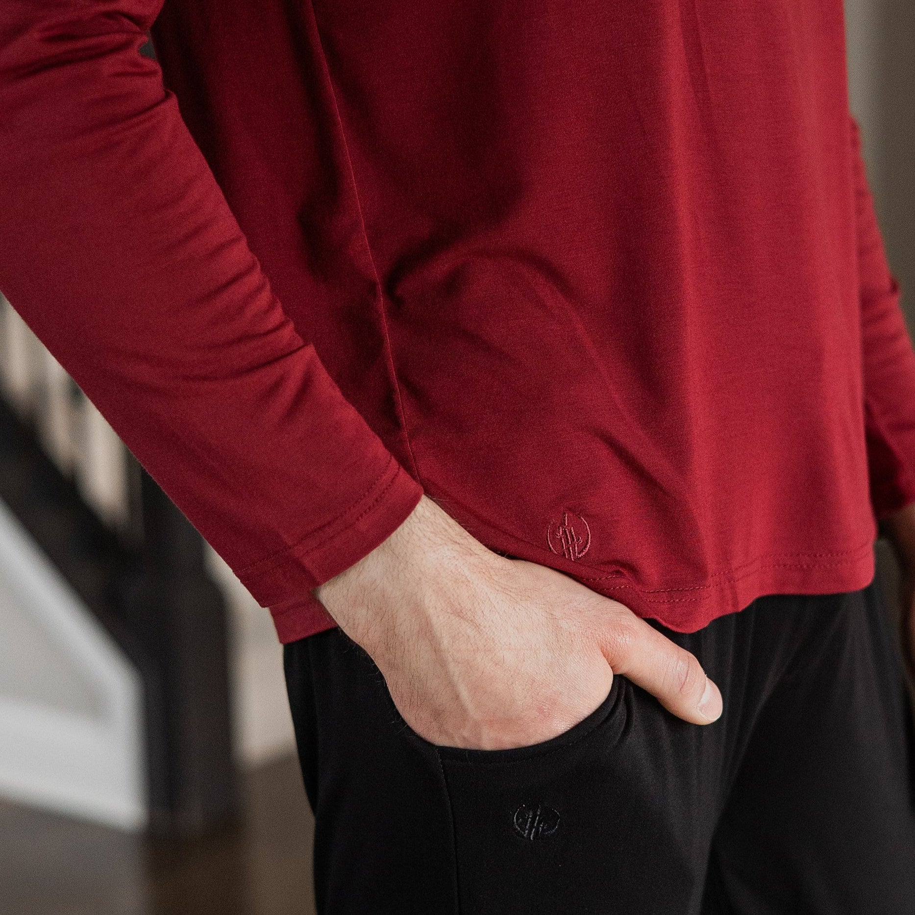 Garnet red long sleeved bamboo shirt for men that's perfect for a moisture-wicking base layer or a cool morning jog.