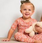 Orange Blossom short sleeve bamboo pajamas from Earthly Threads is the perfect happy neutral for your little daydream believer.