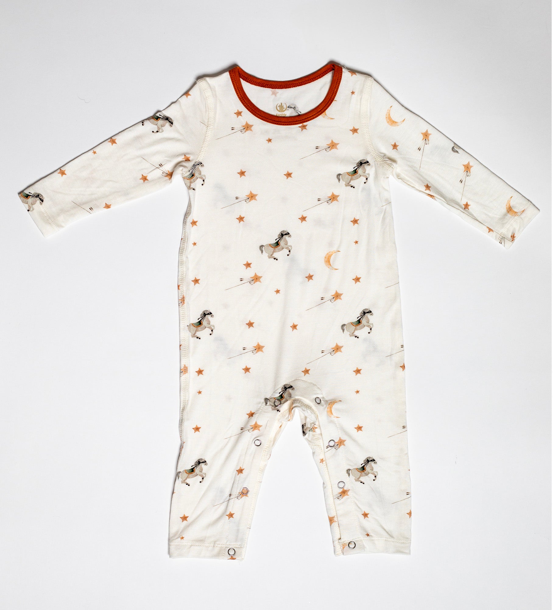 Cozy Pony Up bamboo snap romper with masked ponies, stars, and moons, crafted for breathable, all-night comfort.