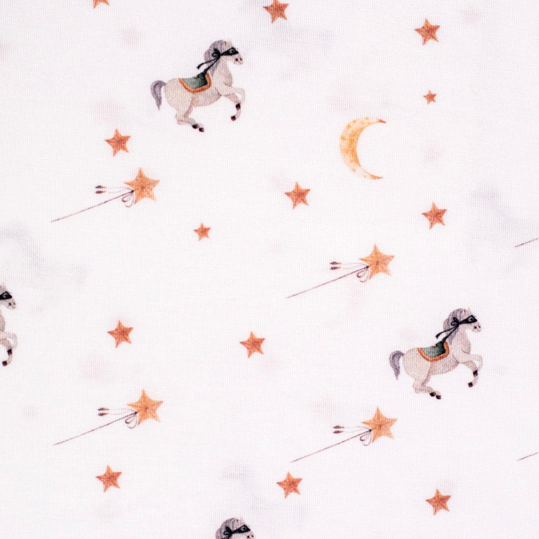 Eco-friendly bamboo pajamas with a charming horse and moon pattern, designed for comfort and nighttime fun.