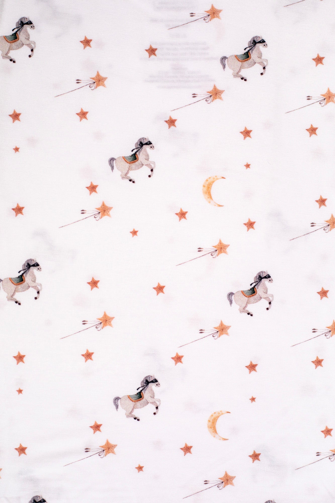 Eco-friendly bamboo pajamas with a charming horse and moon pattern, designed for comfort and nighttime fun.