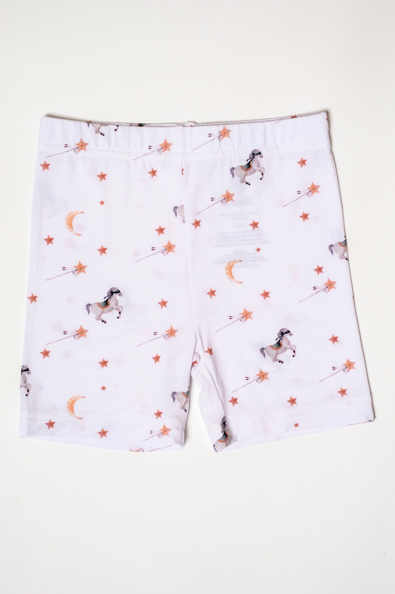 Hypoallergenic and stretchable bamboo pajama set with an enchanting pony print, available in short sleeves and shorts.