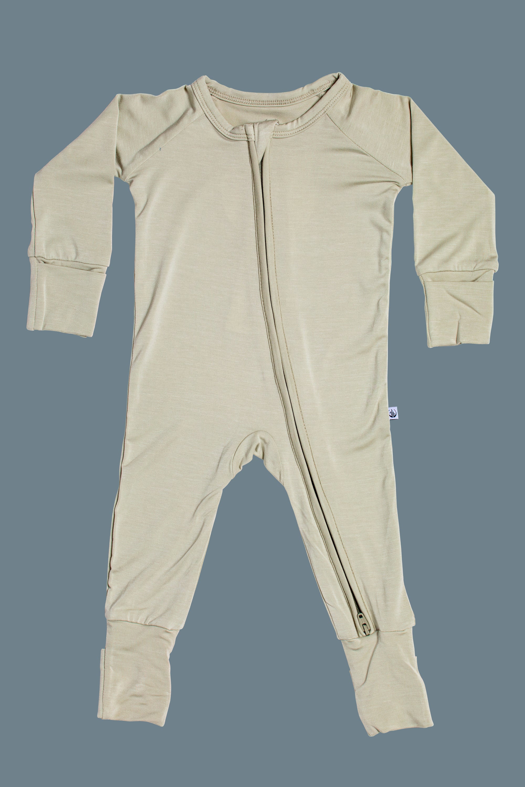 Stalk organic bamboo baby sleeper with a zip closure and fold-over cuffs, perfect for sensitive skin and temperature regulation.
