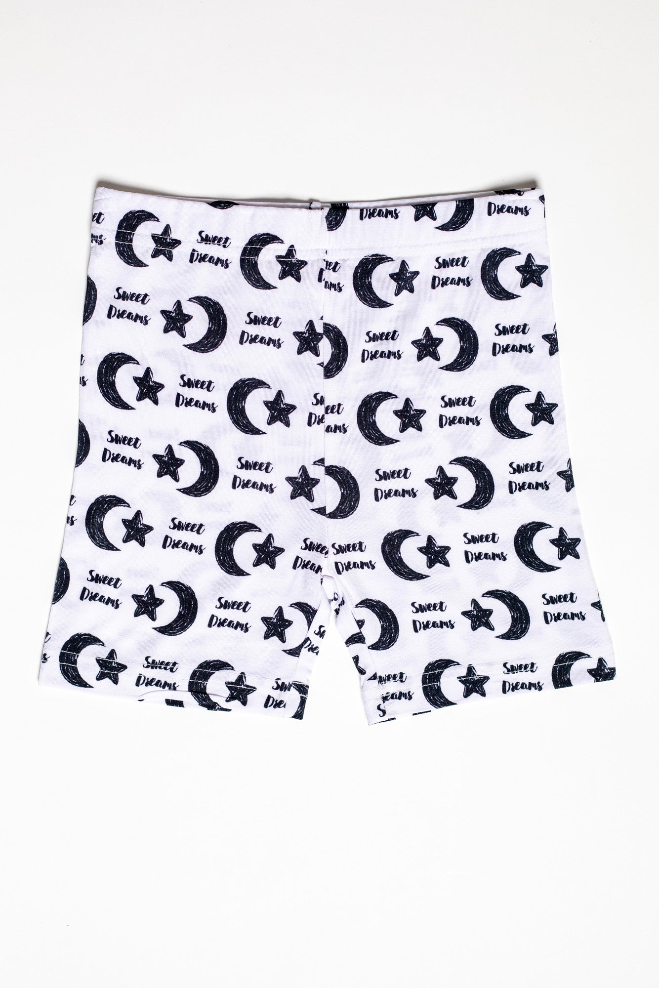 Earthly Threads cozy and hypoallergenic kids pajamas with celestial, stars, crescent moon, and “Sweet Dreams” lettering.