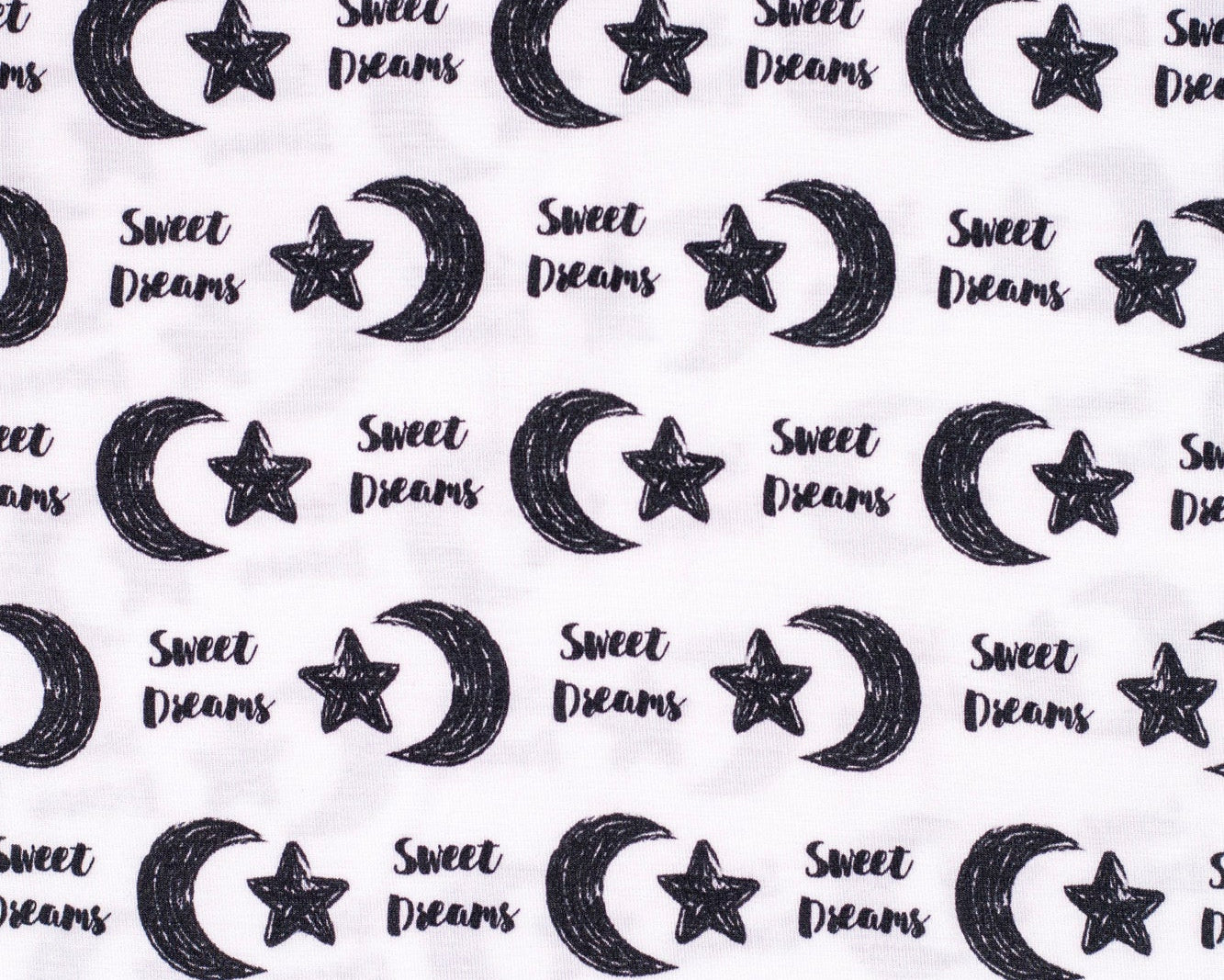 Earthly Threads incredibly soft short sleeve pajama set with moon and stars, alongside the words “Sweet Dreams”.