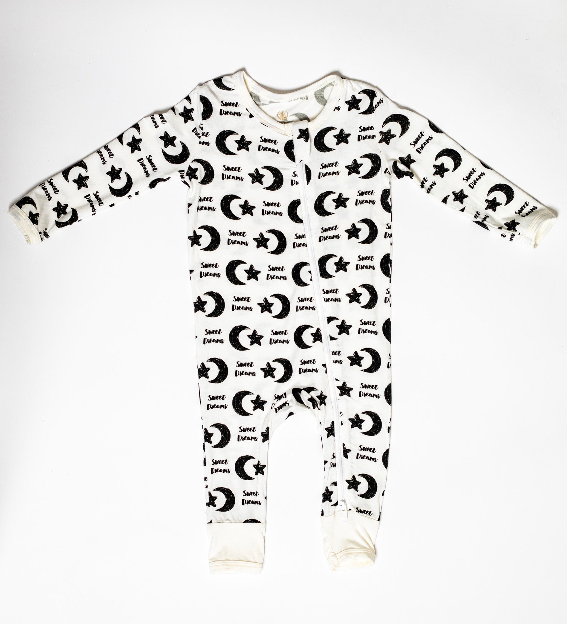 One-piece zip-up sleeper with a peaceful moon and star print, designed for warmth without overheating.