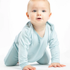 Blue snap baby romper made from antibacterial, eco-friendly, and amazingly soft bamboo fabric for lasting comfort.