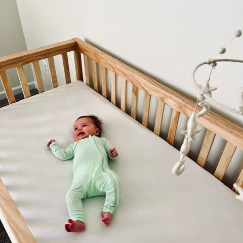 Lightweight and breathable organic bamboo crib sheet in a classic white color. Designed to keep babies cool in the summer and cozy in the winter.