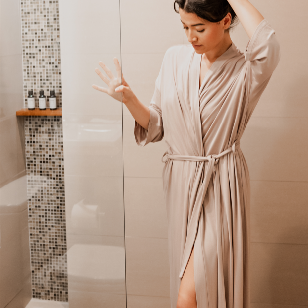  Wrap yourself in soft luxury with Earthly Thread's serene robe. Shown here in oyster.